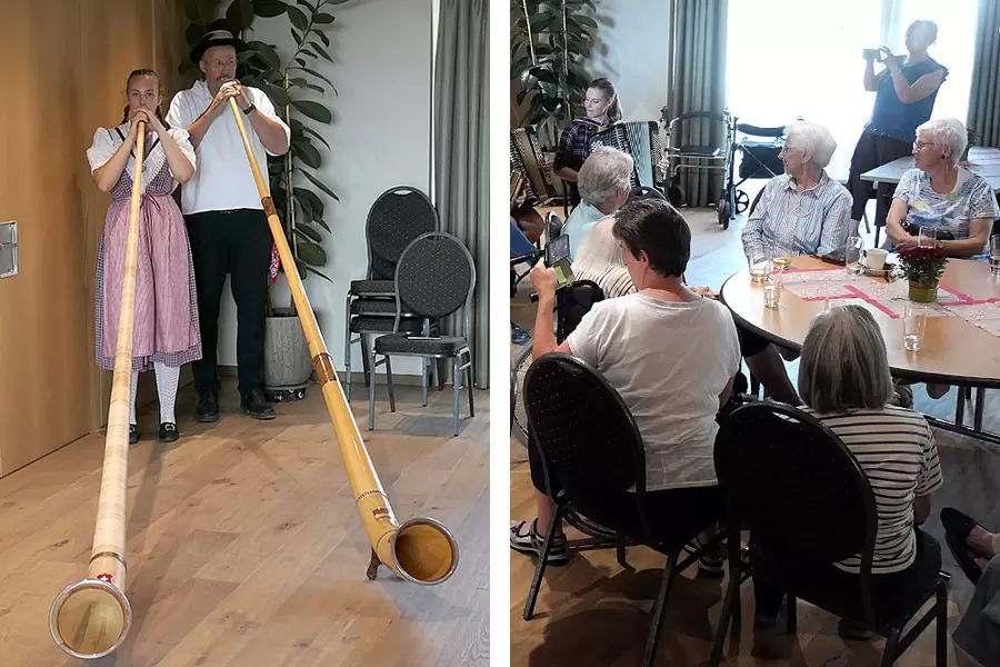 Am Alphorn blasen Yvonne und Ueli Ott. Dem Publikum gefällt's.